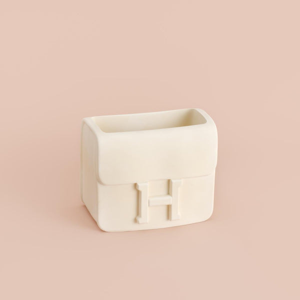 H handbag concrete vase